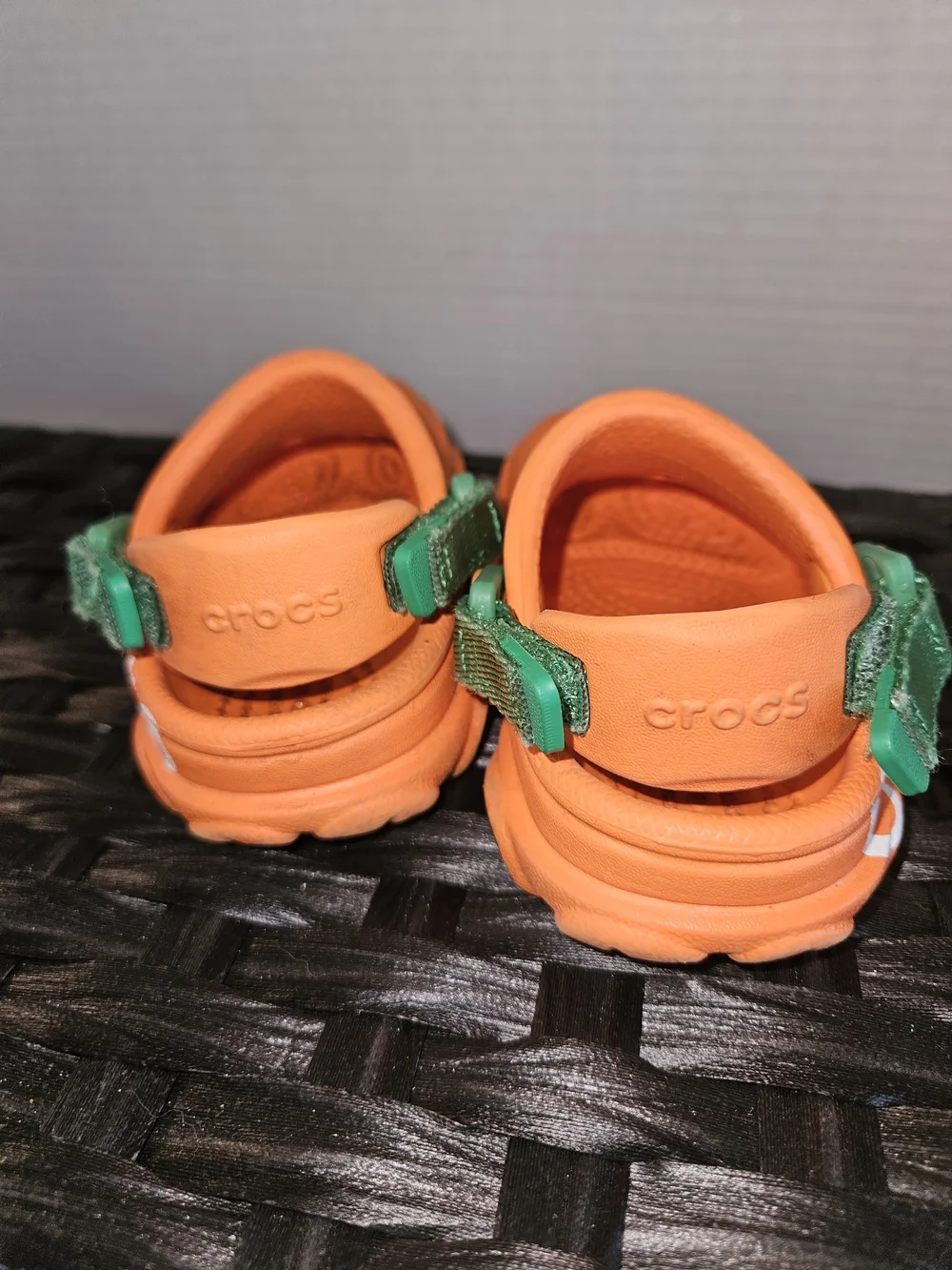 CROCS Kids Orange Clogs with Green Strap and Carrot Charm